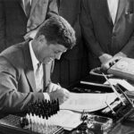 Kennedy Signing Law